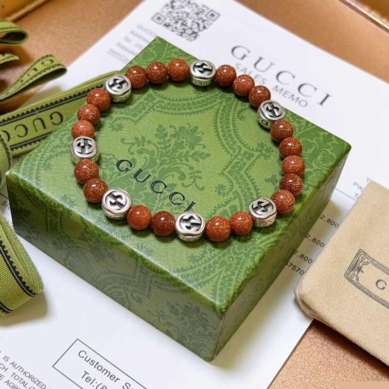 G*u*i bracelets
